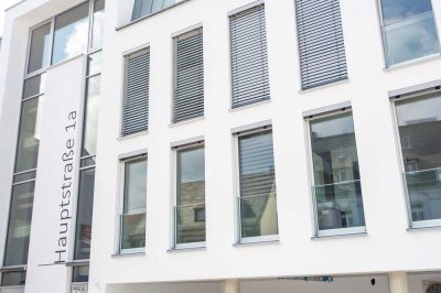 Exklusive EG-Wohnung mit großzügiger Terrasse und Einbauküche, ideal für 1 - 2 Personen