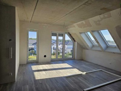 Exklusive 3-Raum-Dachgeschosswohnung mit Balkon in Bad Waldliesborn - Erstbezug!