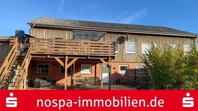 Modernisiertes Reihenmittelhaus mit Balkon, Garage und Doppelcarport!
