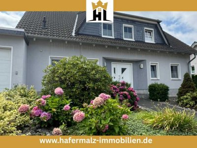 Attraktives Einfamilienhaus mit Einliegerwohnung GS-Sudmerberg – Gartenidylle inklusive