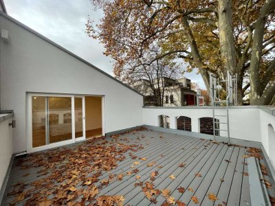Außergewöhnliche Wohnung mit großer Dachterrasse und Einbauküche in Kurparknähe!