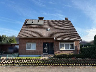 Gemütliches Zuhause mit vermieteter Einliegerwohnung auf großem Grundstück
