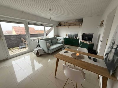 Charmante 2-Zimmer-Dachgeschosswohnung mit kleiner Dachterrasse in zentraler Lage