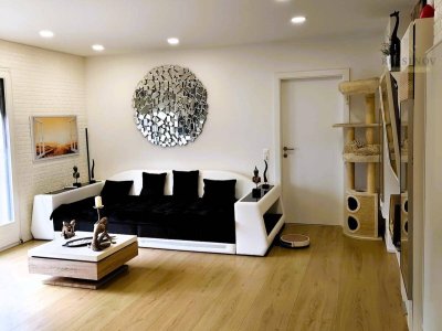 Moderne 3-Zimmer-Wohnung mit Gartenanteil
