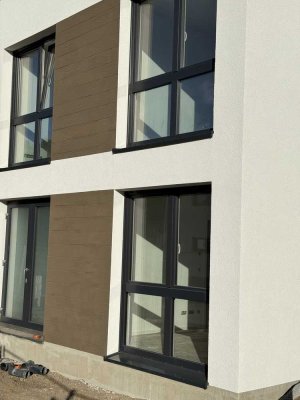 Moderne, energieeffiziente 2-Zimmer-Whg. mit Stellplatz und Garten