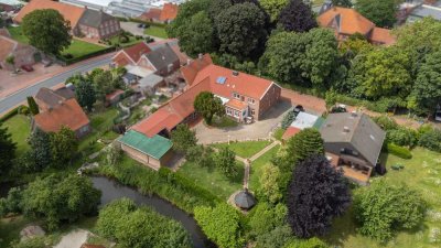 Großzügige Wohn- und Gewerbeimmobilie mit Gartenidylle am Wasser