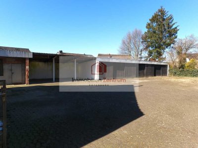 Zweifamilienhaus mit 7 Garagen auf großem Grundstück