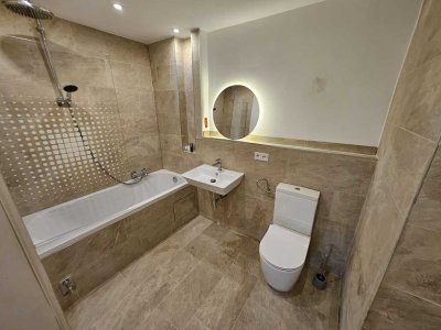 Exklusive 2-Zimmer-Wohnung mit Balkon und Einzelgarage - Erstbezug nach hochwertiger Renovierung