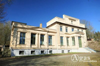 Denkmalgeschütztes Wohn- und Geschäftshaus im italienischen Villenstil