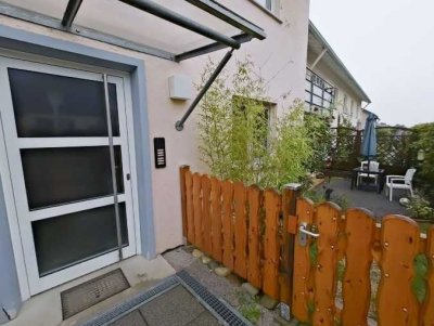 *Charmante und gepflegte Terrassenwohnung mit grünem Rückzugsort!*