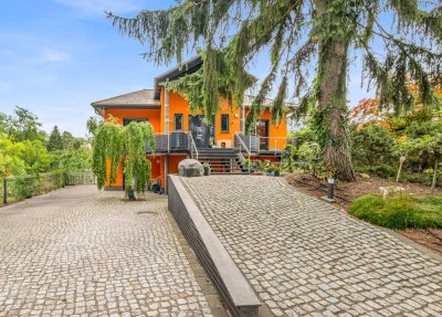 Architektenvilla mit exklusiver Ausstattung, großzügigem Grundstück und Pool