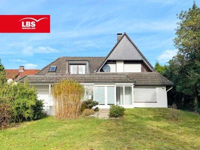 Großzügiges 1-2 Familienhaus mit Garage und großem Garten!