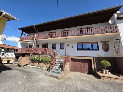 Warmsroth - Großzügiges Einfamilienhaus mit Scheune in ruhiger Lage!