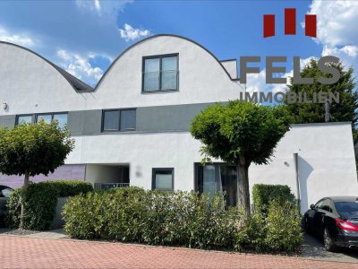 Außergewöhnliches 3-Familien-Haus – eine Ikone der Architektur in Spitzen-Wohnlage!
