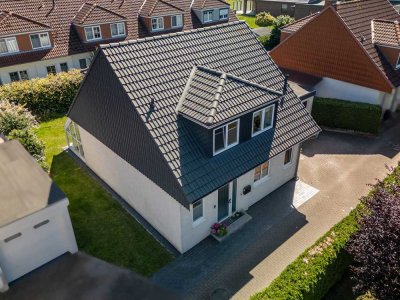 Freistehendes Einfamilienhaus mit Wintergarten & lichtdurchfluteten Wohnräumen in Toplage