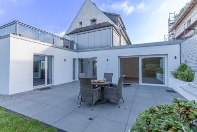 Erstbezug nach Kernsanierung! 3,5-Zimmer-Wohnung mit ca. 132 m², großer Terrasse, Garten