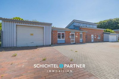 Loxstedt | Spannendes Einfamilienhaus mit Gewerbeanteil und schönem Garten