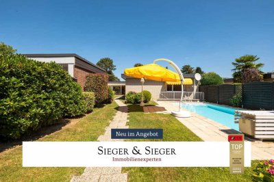 Rembrandts Meisterwerk für die Familie: Bungalow mit Pool und Sauna in der Gartenstadt