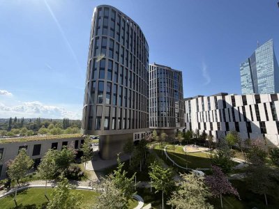 Ruhige 2-Zimmer-Neubauwohnung im HPQ am Main/EZB – möbliert, große Loggia & E-Stellplatz