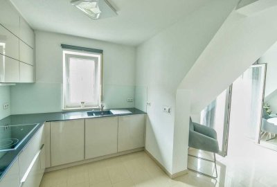 Exklusive 2,5-Zimmer-Maisonette-Wohnung mit Balkon und Markeneinbauküche im Altstadtpark Bad Urach