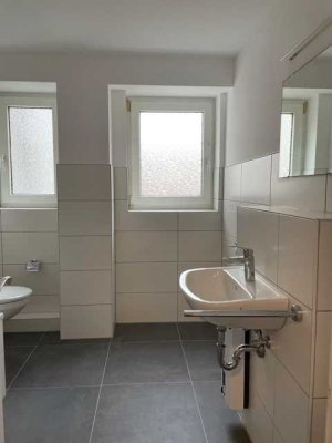 Sehr schön sanierte Wohnung mit Parkettböden und Wohnküche in stilvollem Altbau!