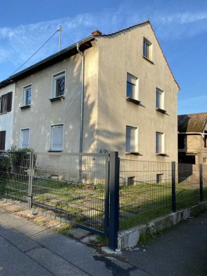 2 Doppelhaushälften mit Grundstück ( teilbar ) in Frankfurt Nieder-Eschbach