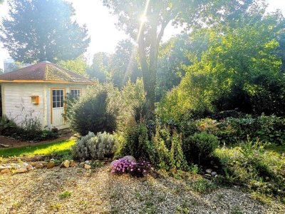 Wohnung an der Isar mit Wintergarten, Garten und Tiefgarage – renoviert oder unrenoviert?