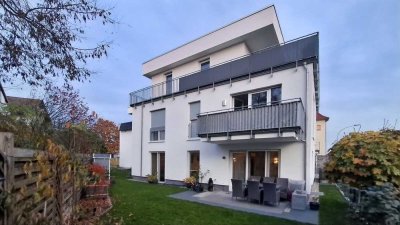 Wohnen auf höchstem Niveau: A+ Effizienz, großer Privatgarten und Tiefgaragenplatz in gesuchter La