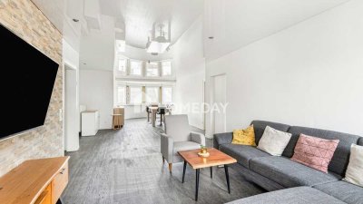 Großzügige DG-Wohnung zentral gelegen in Rhein-Nähe, mit Balkon, Stil und viel Sonne
