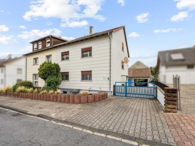 Ein- oder Zweifamilienhaus mit großem Garten in Rheinstetten