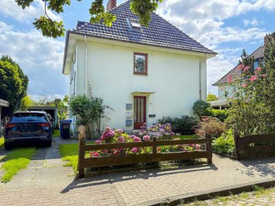 Ein Zuhause mit Gartenidylle! 4 Zimmer-Erdgeschosswohnung mit Garage und besonderem Charme