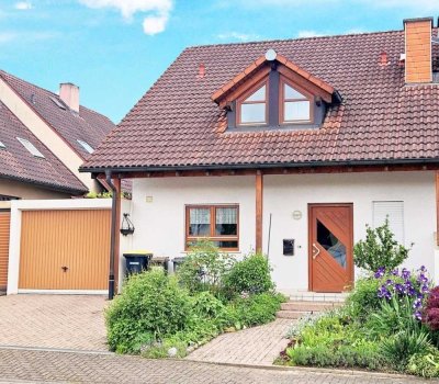 Charmante Doppelhaushälfte mit großzügigem Garten und Garage in beliebter Lage von Schallstadt