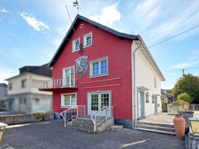 Solides Wohn- und Geschäftshaus mit einer zusätzlichen Wohneinheit auf dem rückseitigen Grundstück