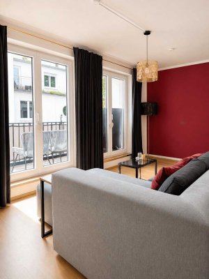 Neuwertige 2-Zimmer-Obergeschosswohnung mit Südbalkon in kleinem Mehrfamilienhaus