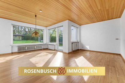 Split-Level-Reihenendhaus mit Garten und Garage.
