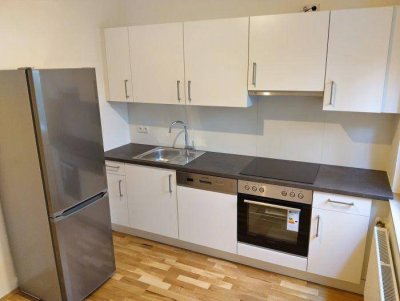 Erstbezug: Sanierter 2 ZIMMER-NEUBAU + extra Küche neu möbliert + neue Sanitäranlagen (Bad + WC)!