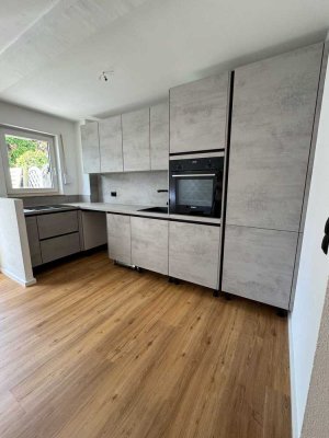 Erstbezug nach Sanierung: Moderne 2-Zimmer-Wohnung mit Garten & Tiefgaragenstellplatz in Bad Wimpfen