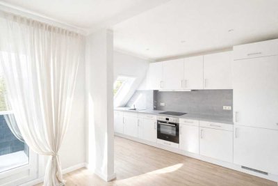 Exklusiv modernisierte 2-Zimmer-Wohnung mit Südloggia und Tiefgaragenstellplatz