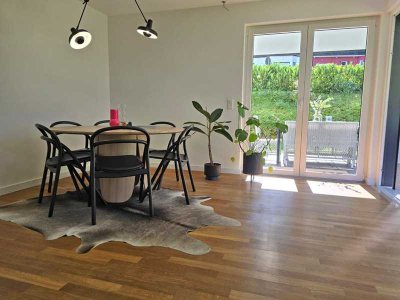 Moderne 3-Zimmer-Erdgeschosswohnung mit Garten, Tiefgarage und hochwertiger Ausstattung