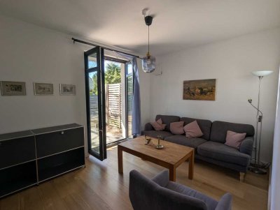 2-Zimmer Neubauwohnung möbliert mit großer Terrasse und Stellplatz