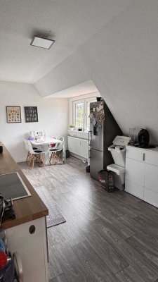 Dachgeschosswohnung mit Gartenanschluss
