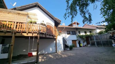 Ehemaliger Bauernhof mit 4 gut vermieteten Wohneinheiten und einer Halle in Welgesheim zu verkaufen