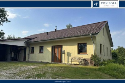 Moderner Bungalow mit Sauna und Hofleben vor der Tür