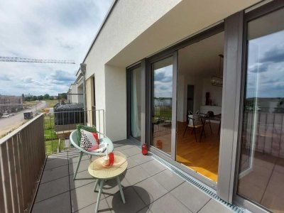 Moderne, hochwertige Neubau-Wohnung mit 2 Balkonen und TG-Stellplatz in Feldrandlage