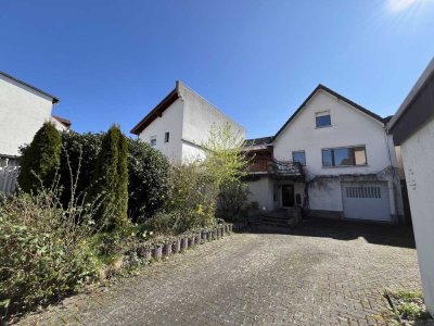 Großzügiges Einfamilienhaus mit Terrasse, Balkon und Garage in guter Lage zu City + THM