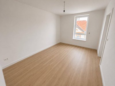 Neubau: Stilvolle Wohnung in bester Lage mit Küche