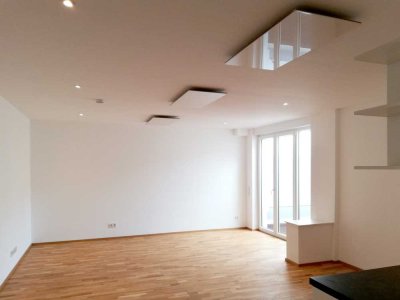 Moderne, bequeme 1-Zimmer-Wohnung mit Einbauküche, Terrasse und Tiefgaragenstellplatz