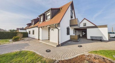 Großzügige Doppelhaushälfte mit Wintergarten und Doppelgarage in idyllischer Lage