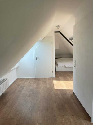 3-Zimmer-Wohnung im OG/DG mit EBK im Außenbereich von Straelen - ländlich gelegen mit großem Garten