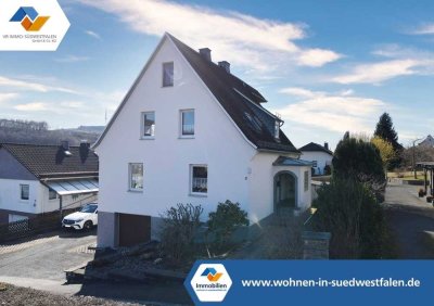 VR IMMO: Zuhause mit Herz- gepflegtes Zweifamilienhaus in guter Lage von Netphen- Grissenbach!